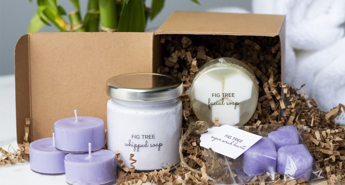 Spa Day in a Box display of tealights, sugar scrub cubes, and candle