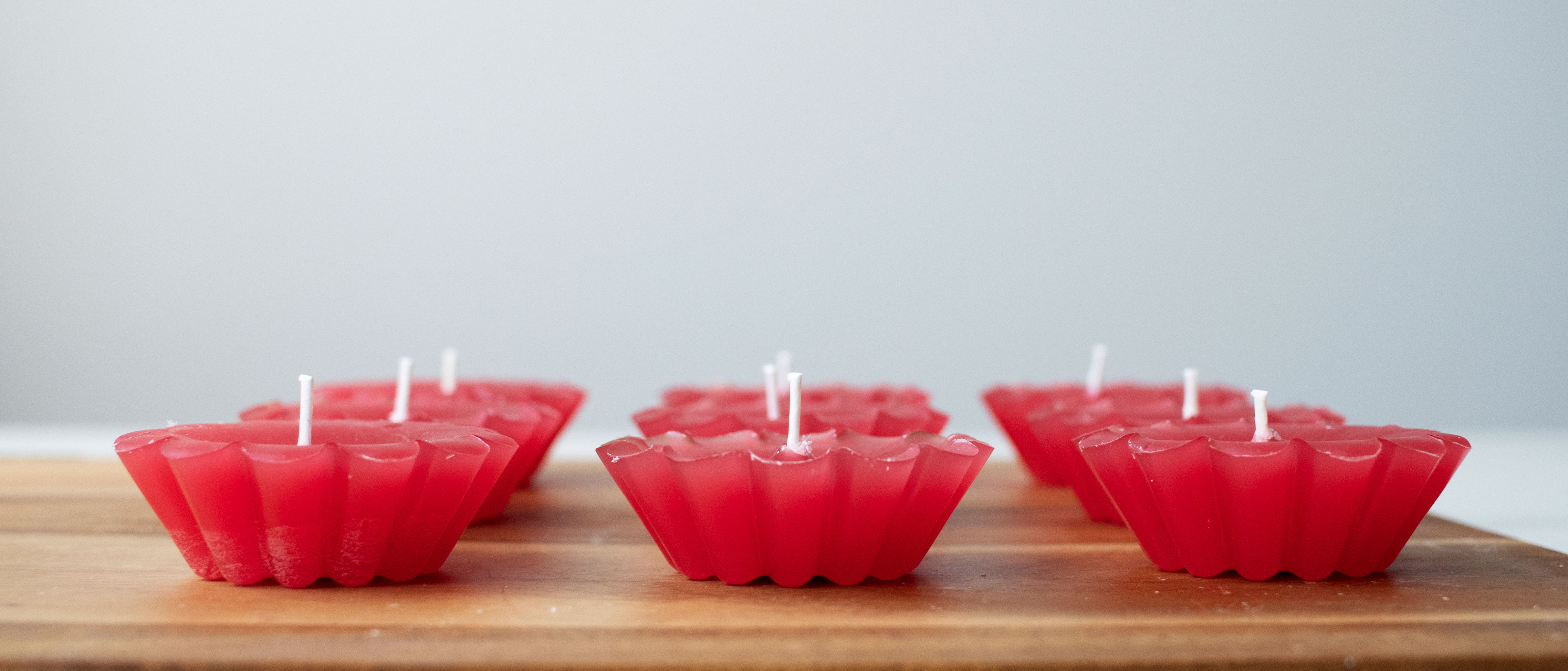 Floating candles lined up.