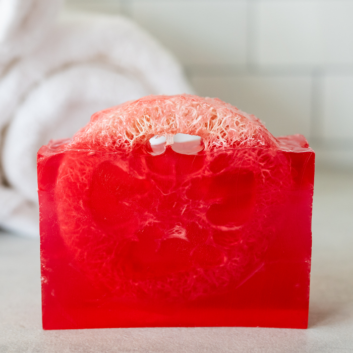 Red melt and pour soap with loofah.