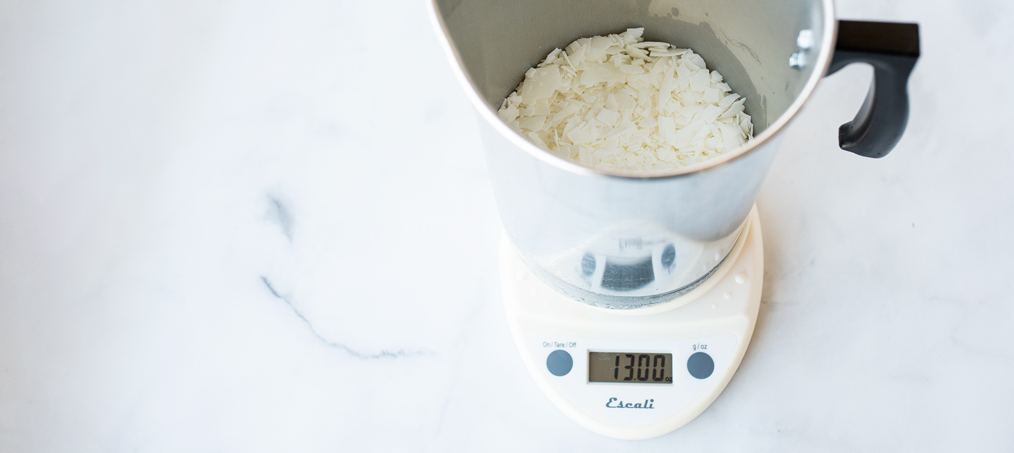 Weight out soy wax flakes to be melted. 