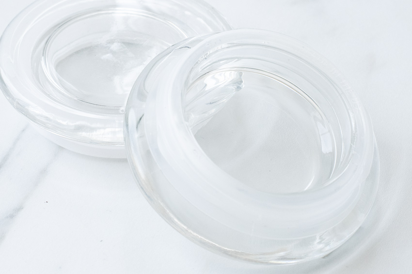 Glass lids for candle jars.