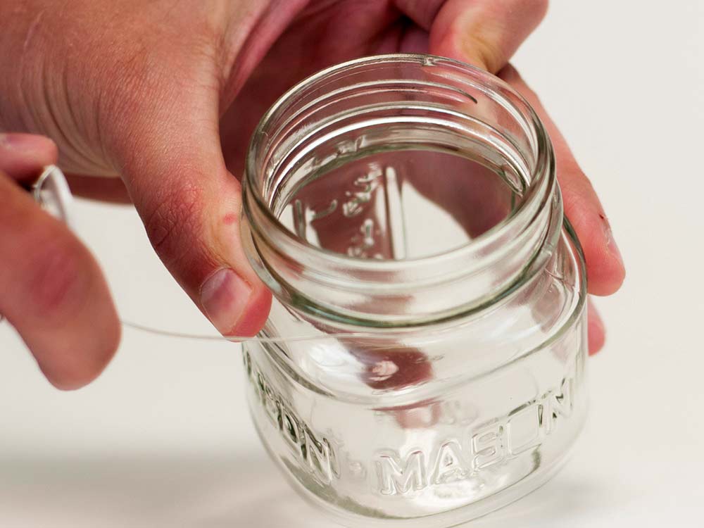 Wrapping a wire around the neck of the jar