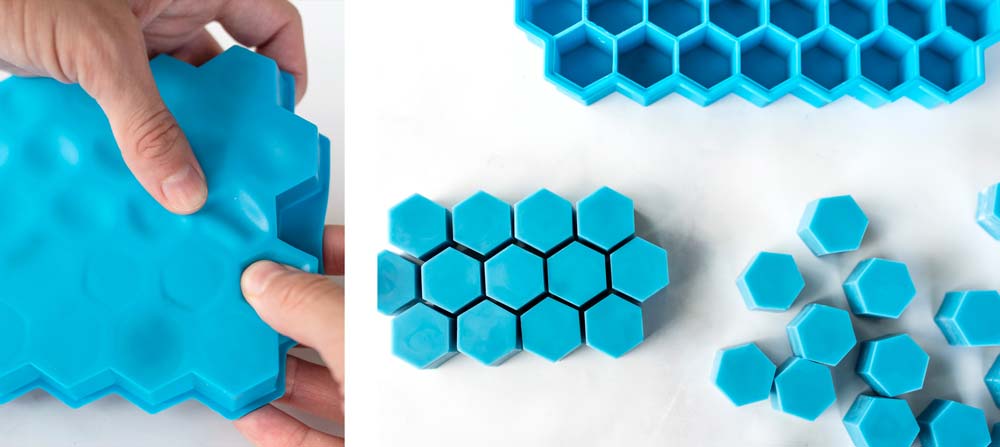How to Make Soy Wax Melts Releasing wax melts from a silicone mold.