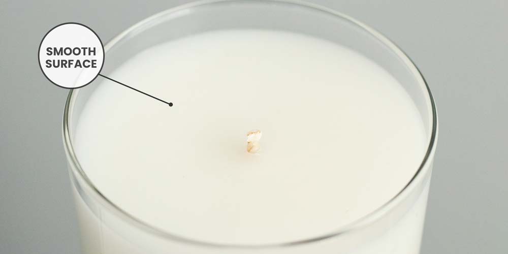 IGI-6046 smooth top web Candle top with an indicator that says "smooth surface".