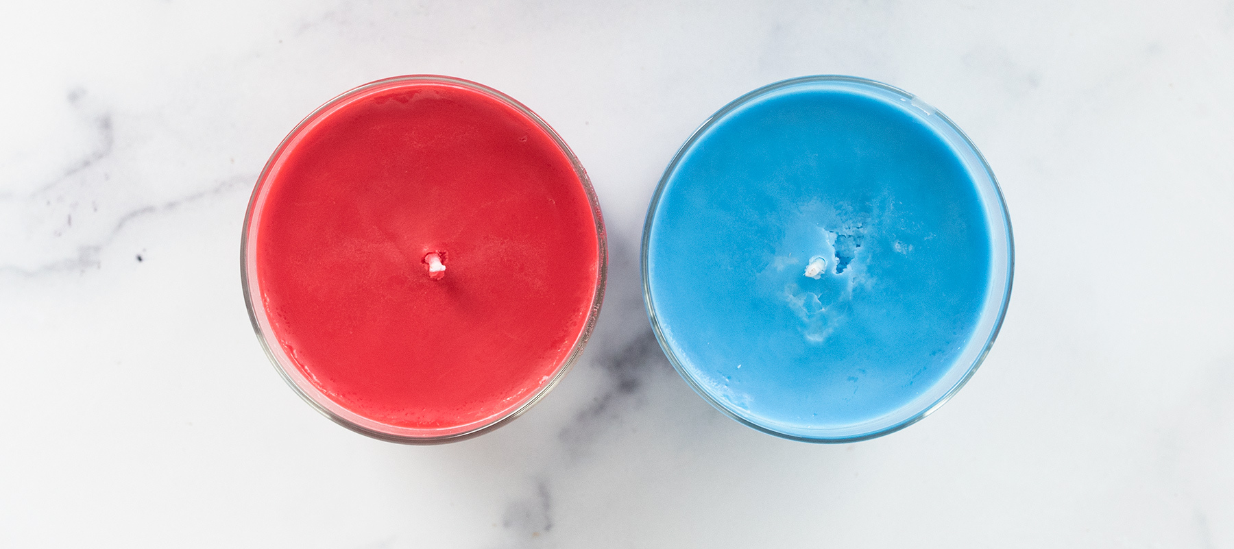 Overhead shot of dyed container candles.