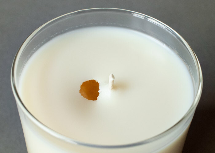 Hole by the wick in a soy candle.