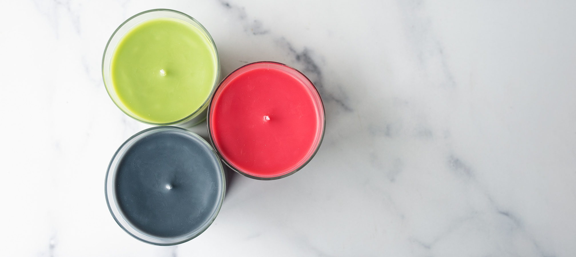 LAB NOTES: Paraffin Pillar Wax MP 117 Overhead shot of dyed candles.