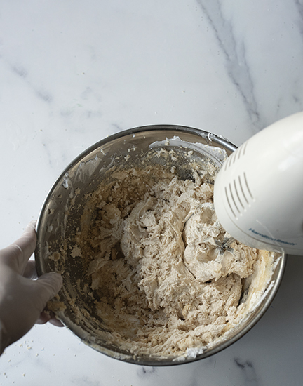 Whipping brown sugar into whipped base.