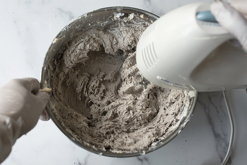 Whipping coffee into sugar scrub.