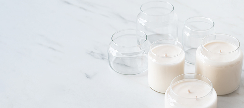 Apothecary jars with candles.