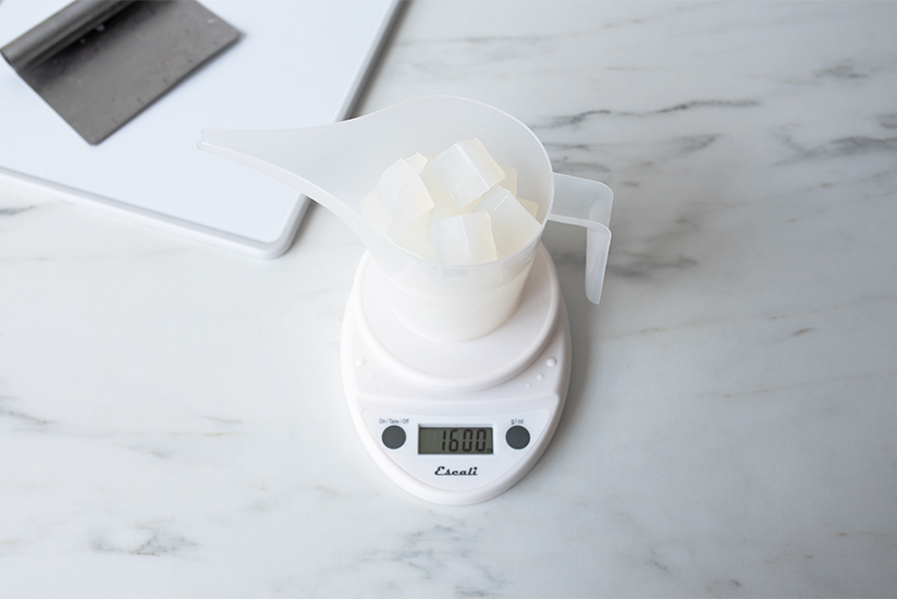 Weighing out soap cubes.