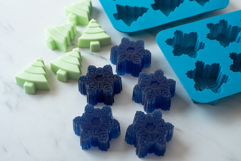 Snowflake and tree soaps with soap molds.