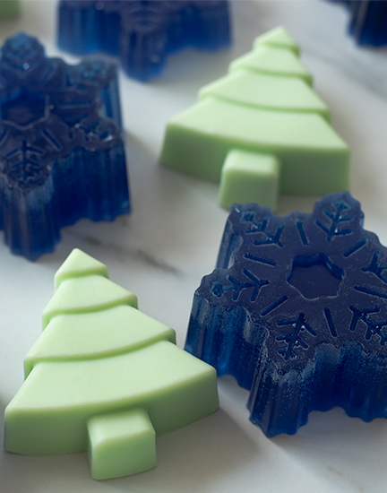 Snowflake and tree soaps.