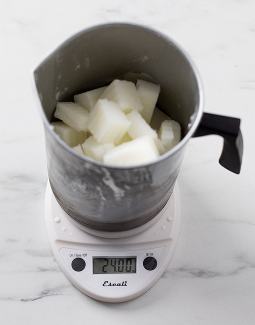 Weighing wax.