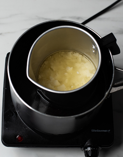 Melting wax on double boiler.