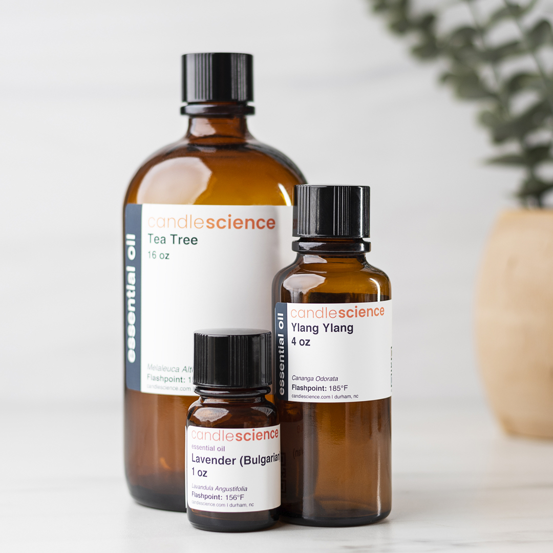 Three bottles of essential oil in three sizes.