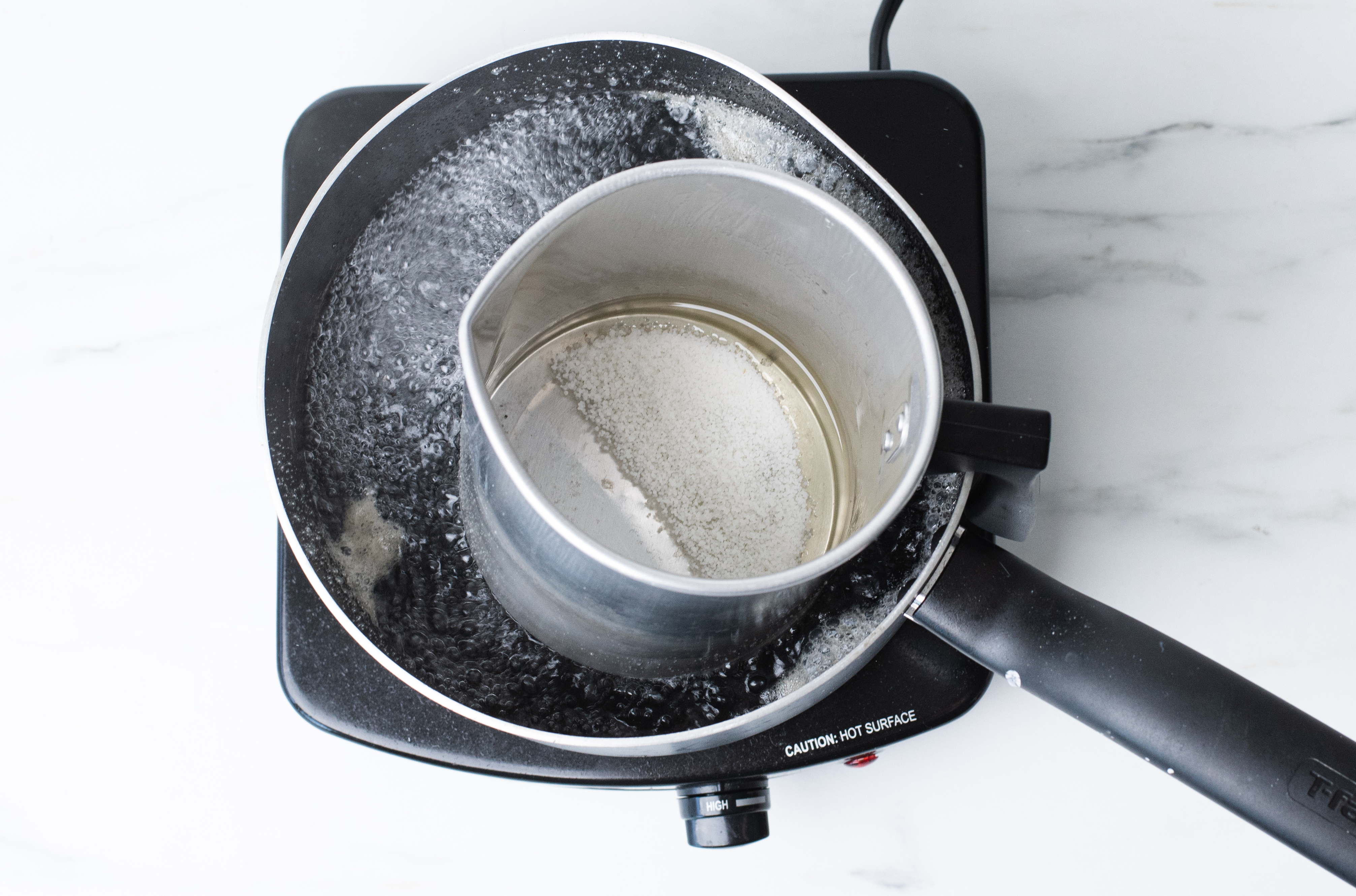 Melting wax on a double boiler.