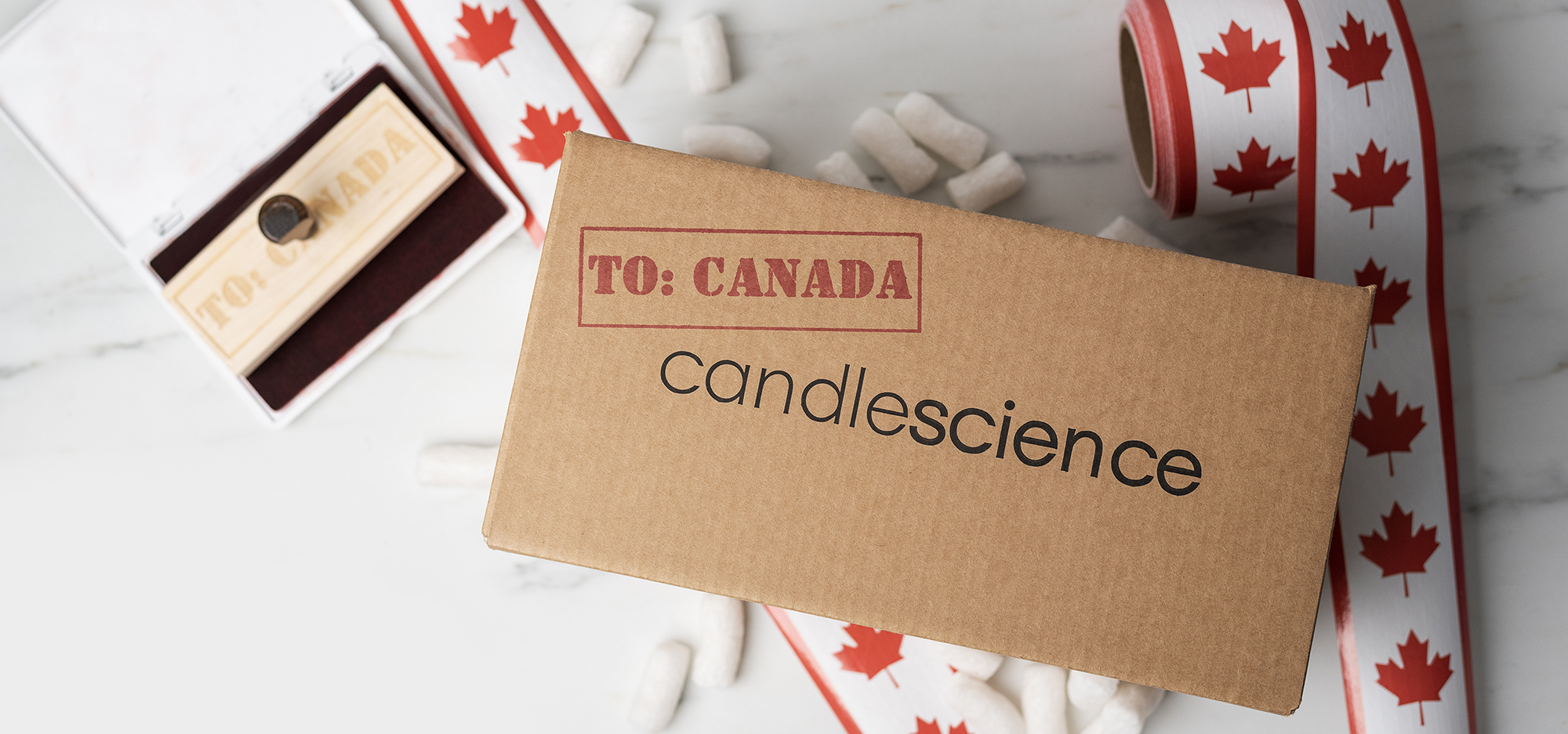 CandleScience shipping box with stamp to Canada.