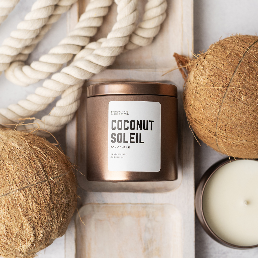 Candle with coconuts and other beachy themes.