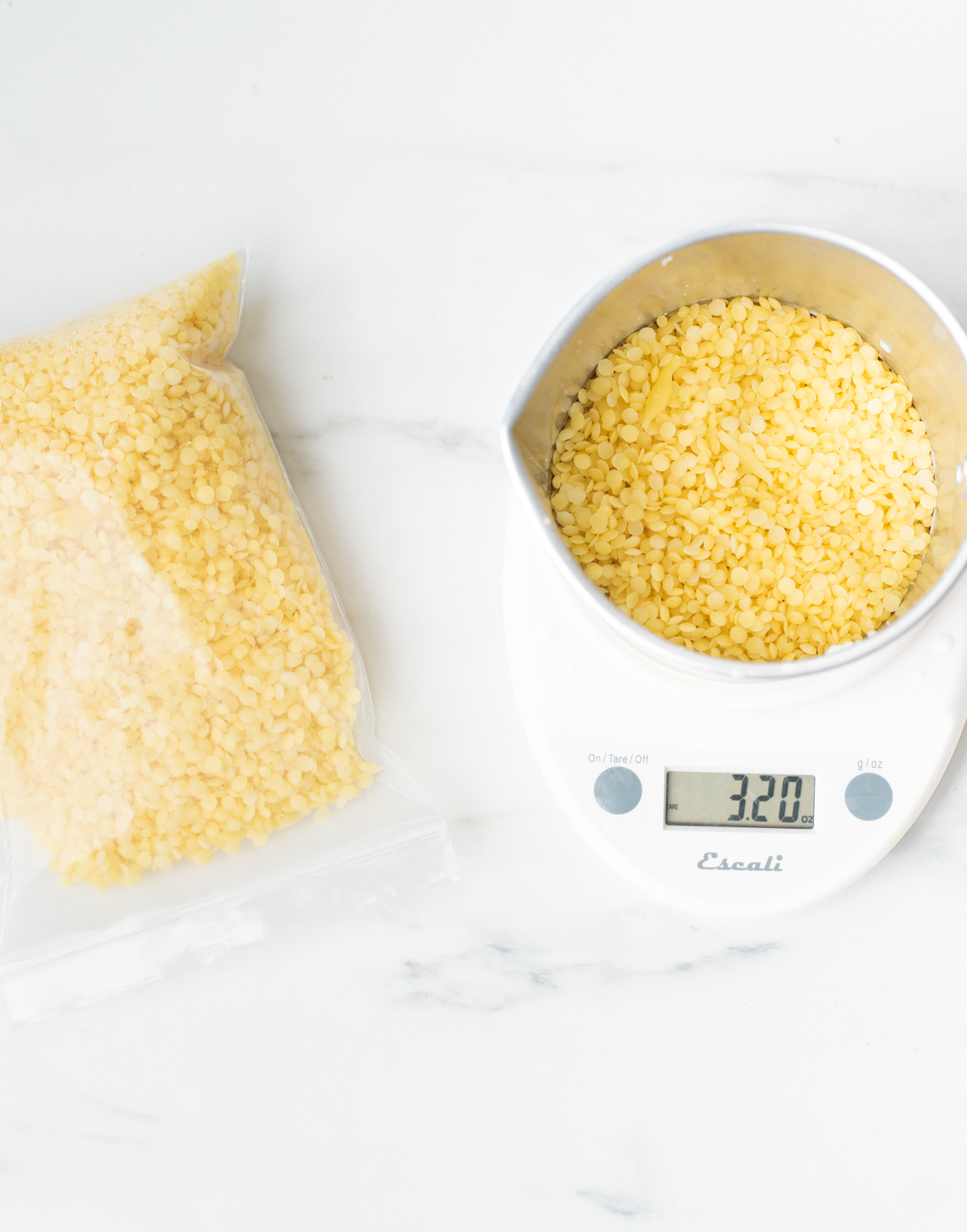 Weighing wax on a digital scale.