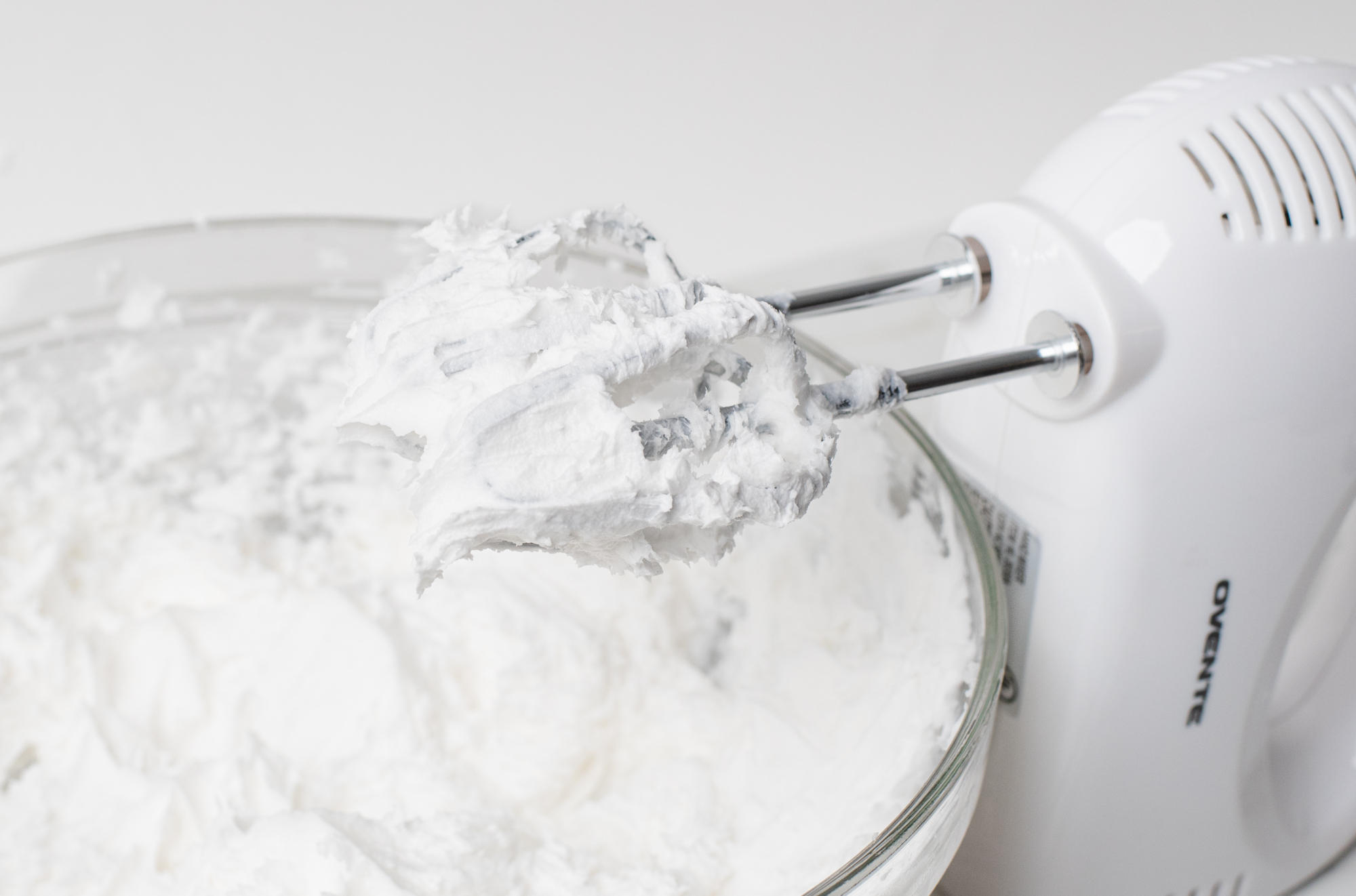 Mixing essential oil into whipped soap.