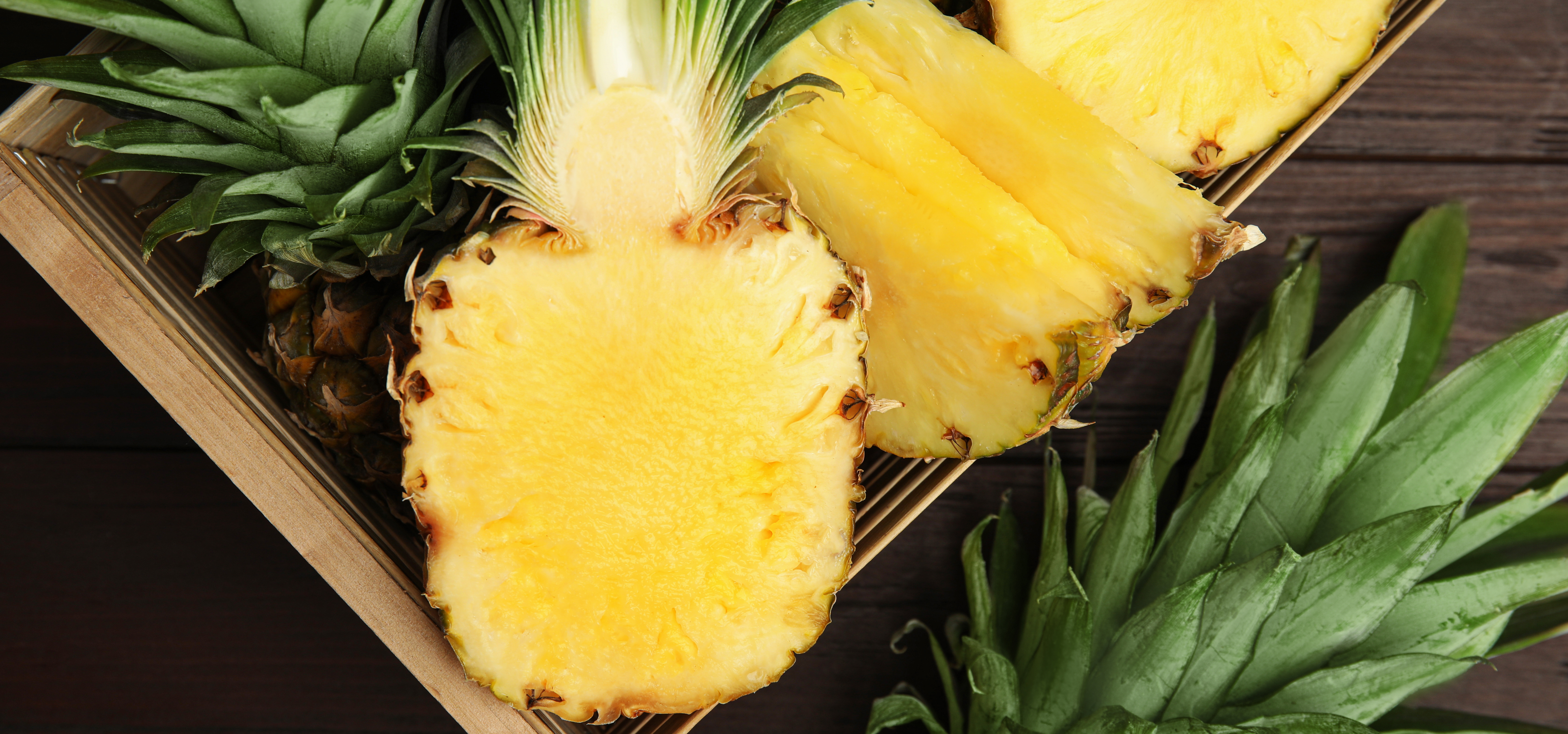 Top-down shot of a pineapple sliced in half. 