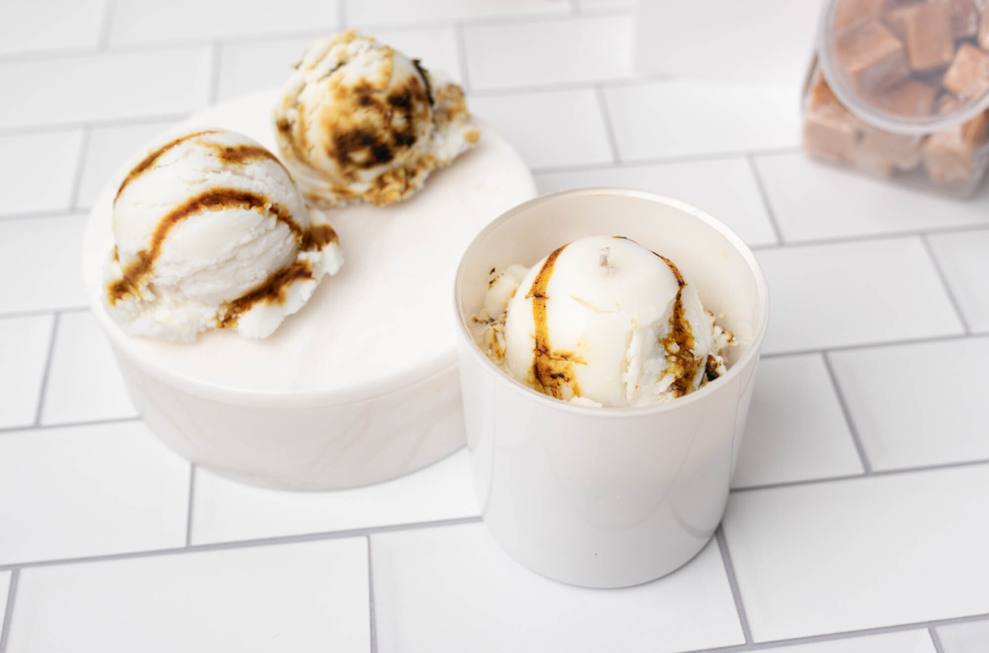 Vanilla ice cream candle with wax chocolate drizzle.