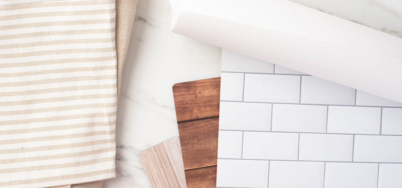 A selection of photo backdrops and surfaces, including subway tile, wood planks, and fabric