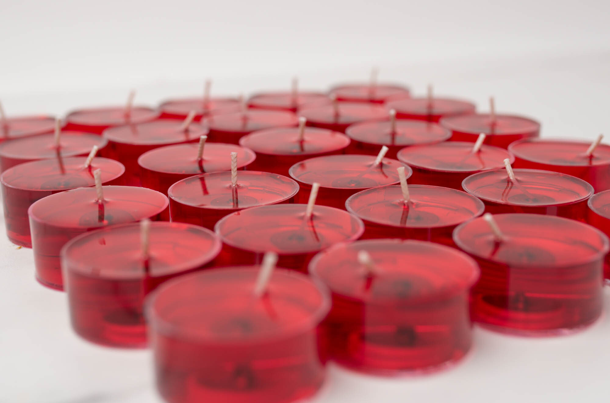 Tealights cooling after they're poured.