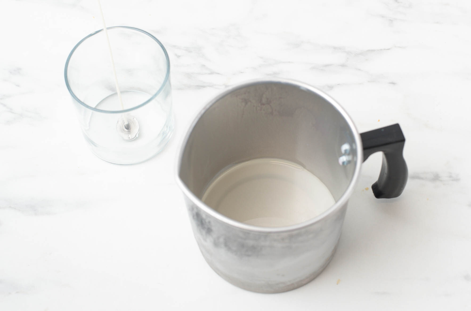 Wax cooling in a pouring pitcher.