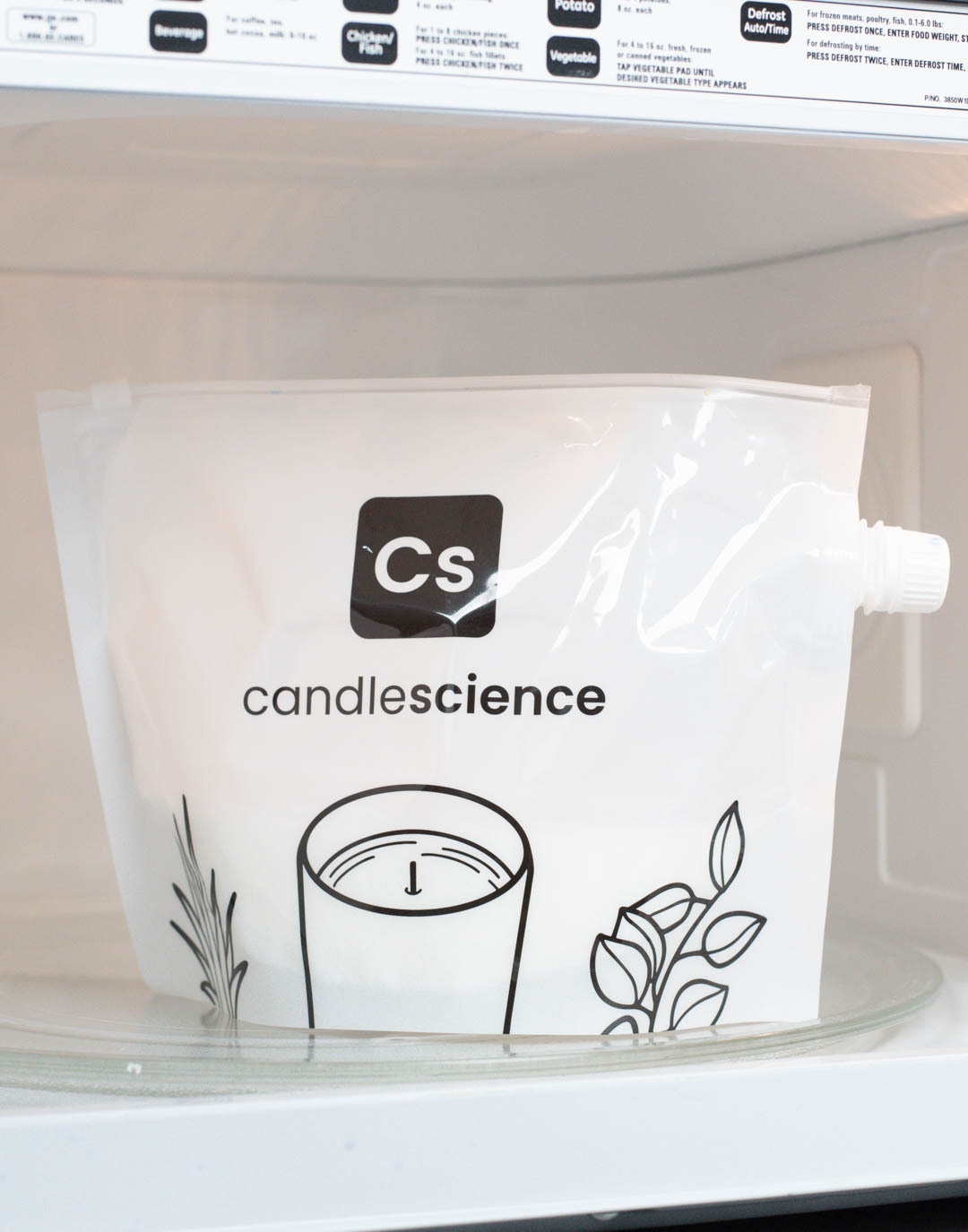 Melting Coconut Apricot Wax in a microwaveable bag.