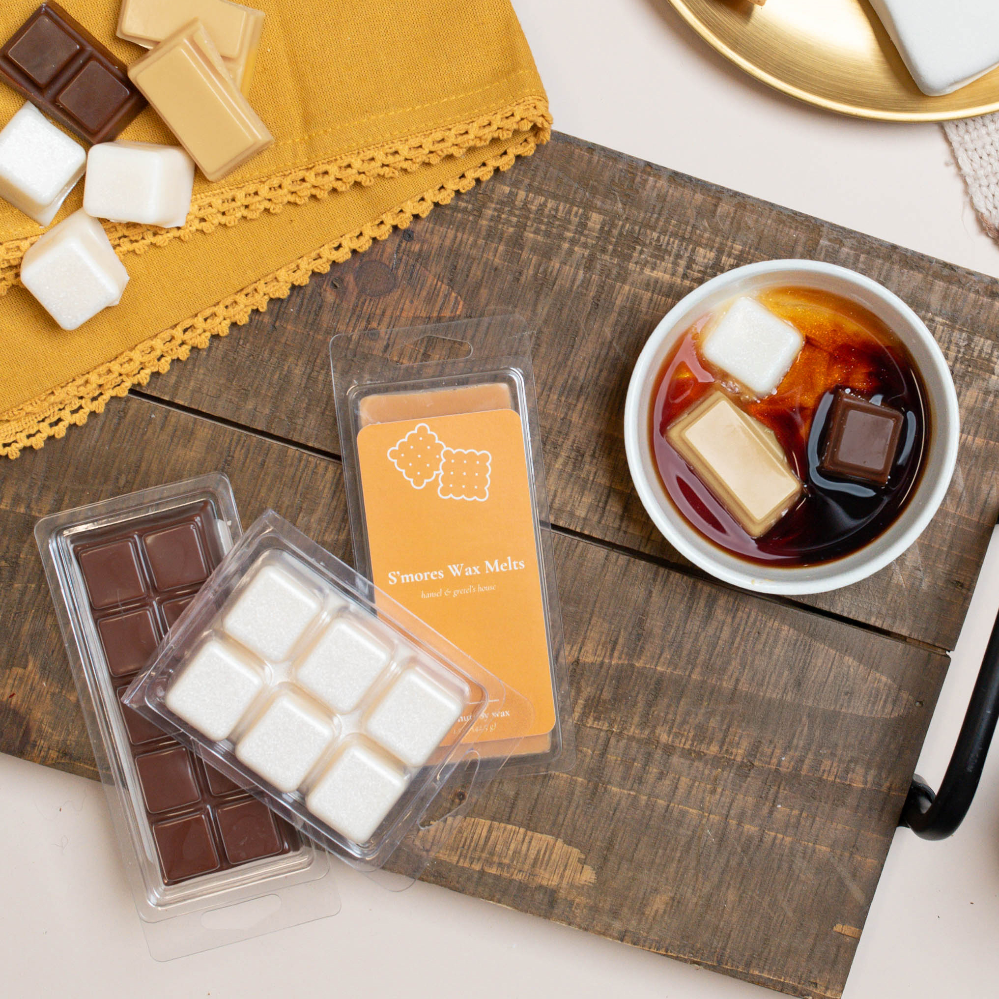 Top down view of s'mores scented wax melts melting in a warmer.