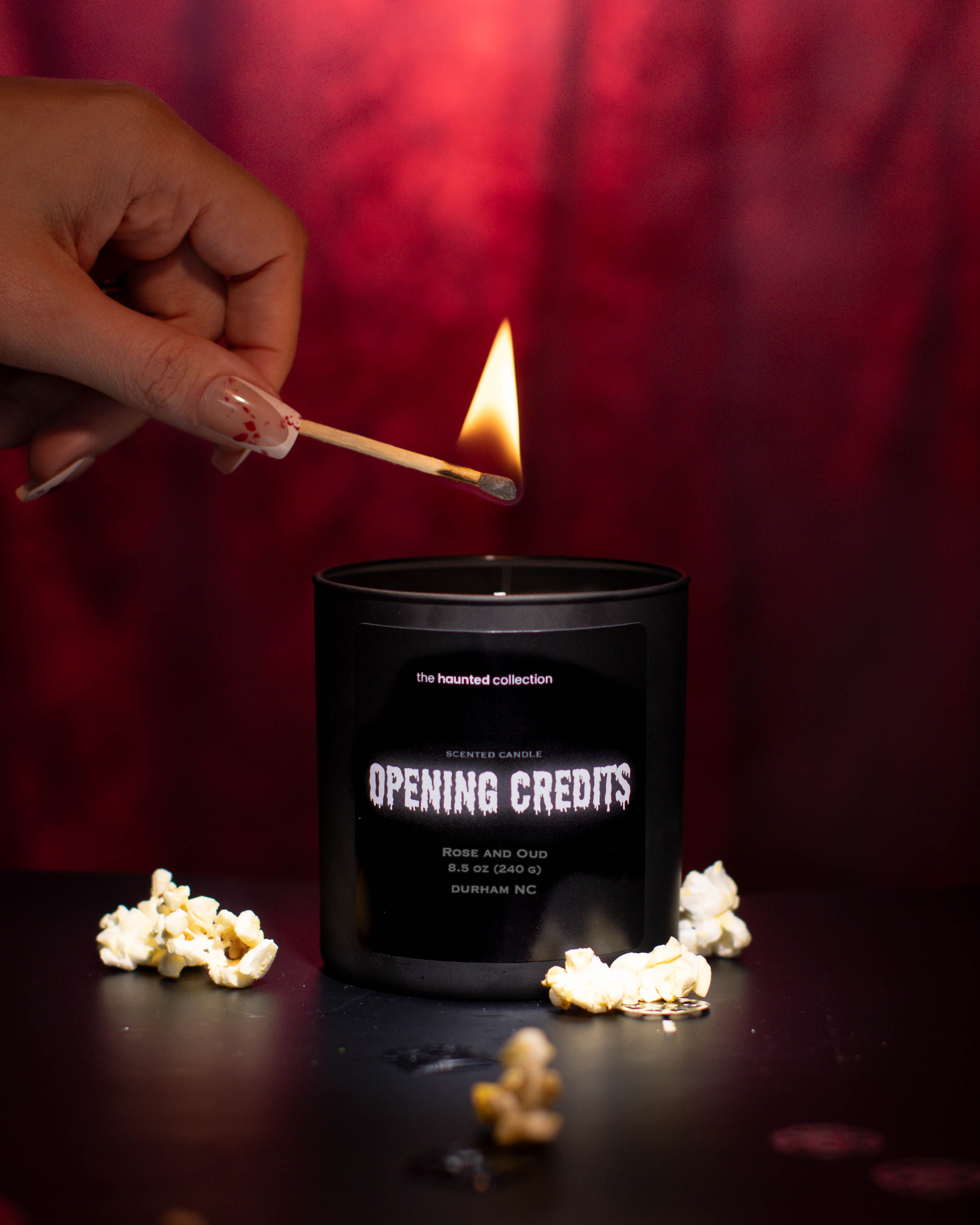 Opening Credits matte black candle.