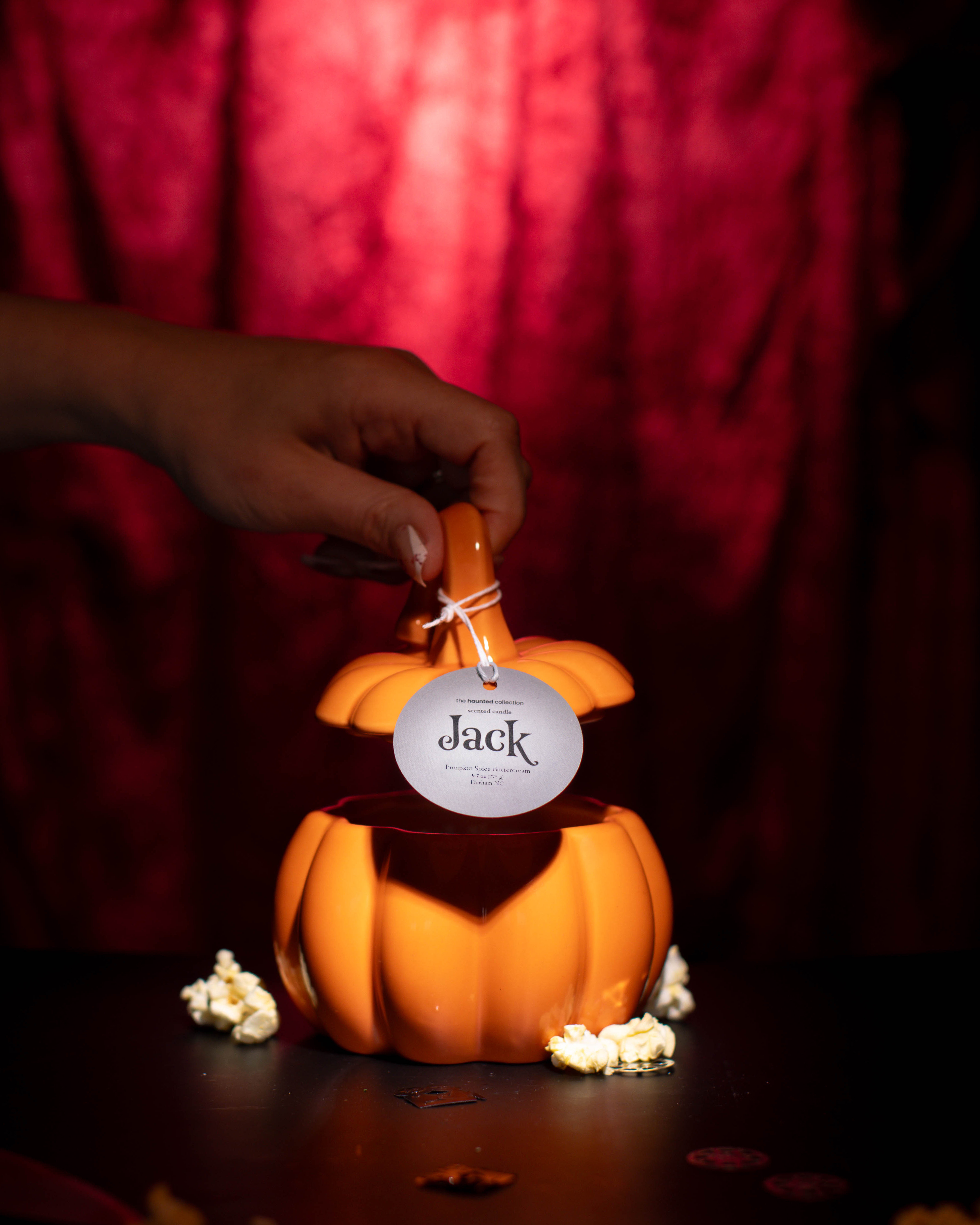 Jack orange stemmed pumpkin candle.