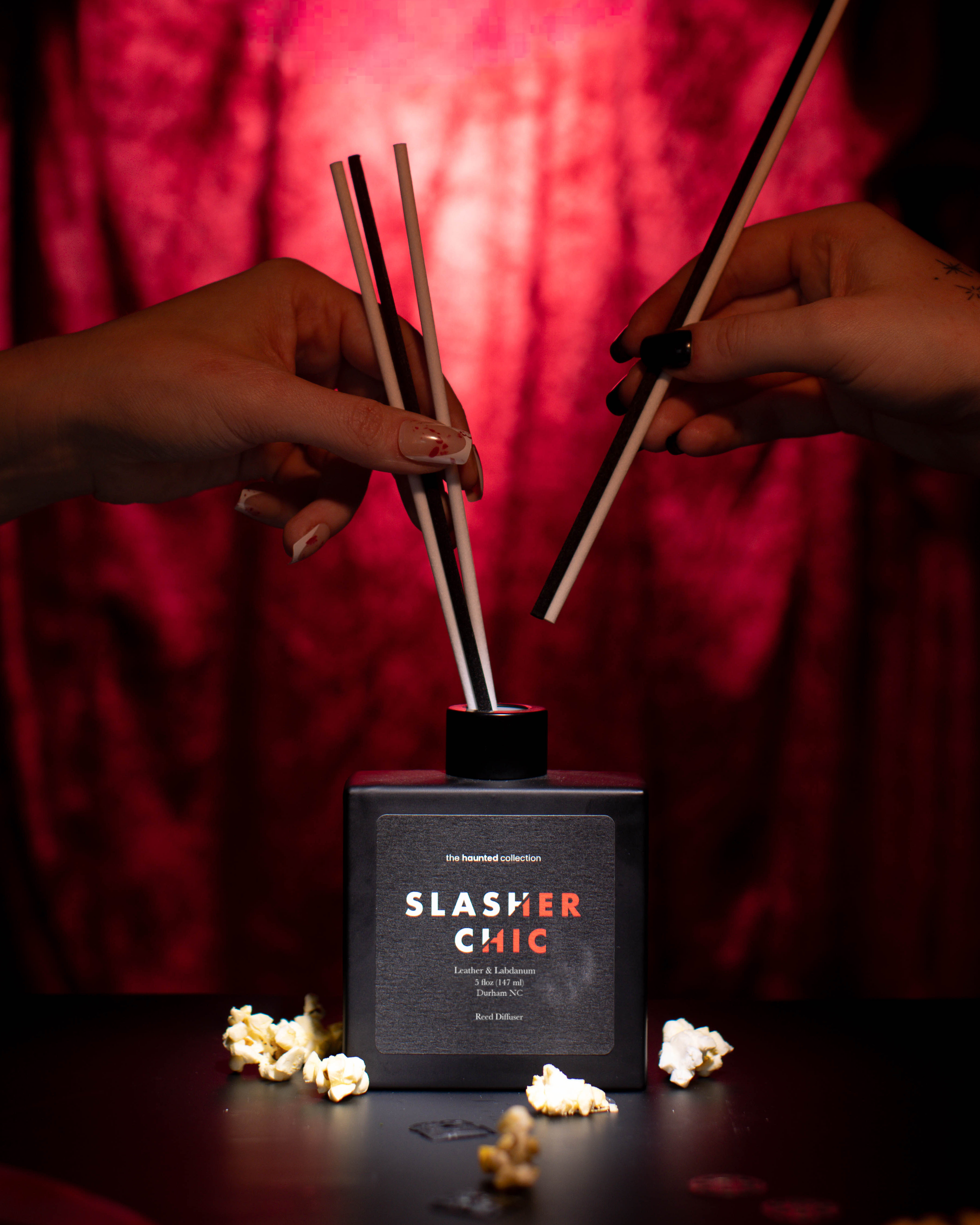 Slasher Chic matte black reed diffuser.
