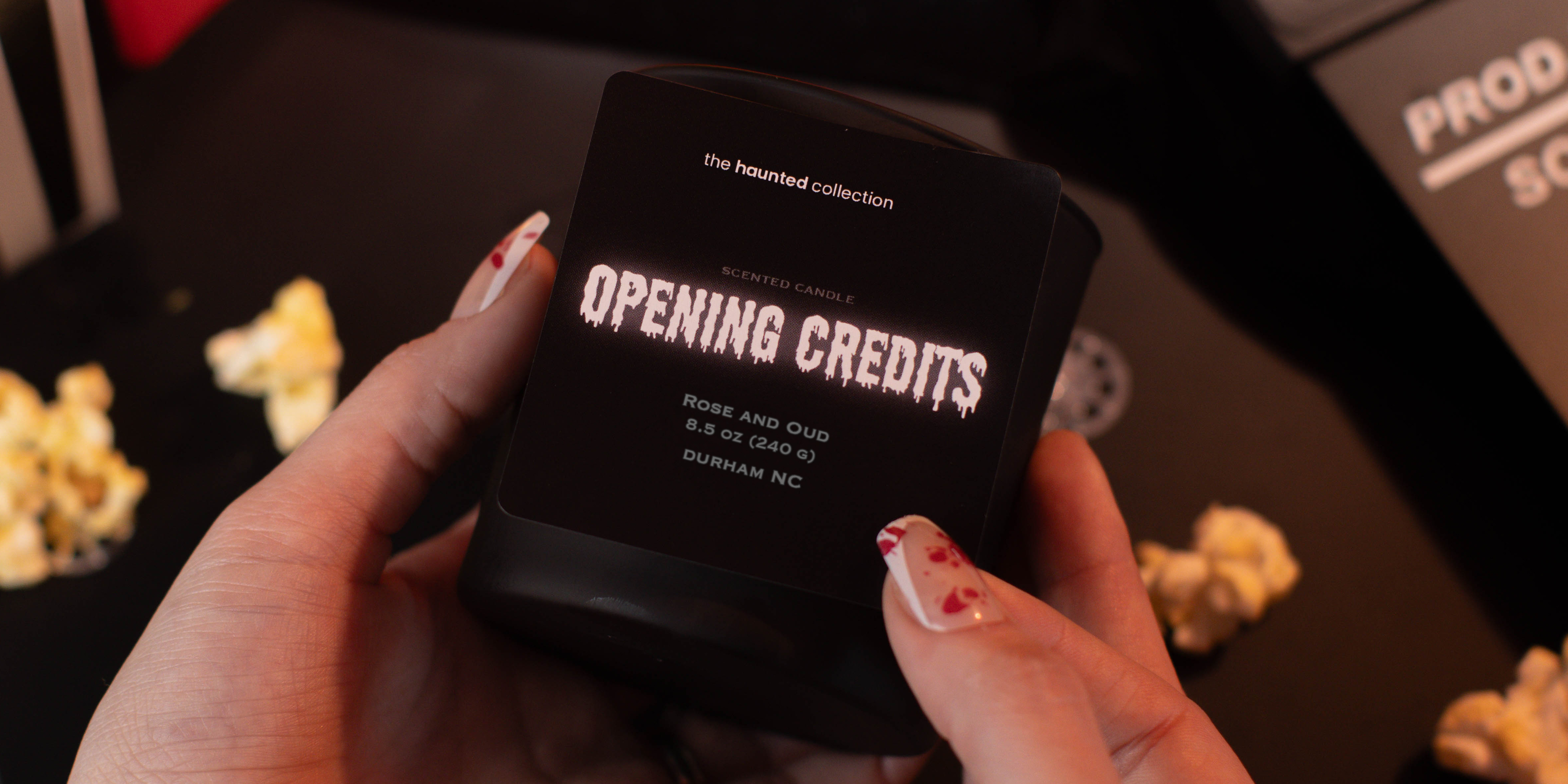 Opening Credits matte black candle.