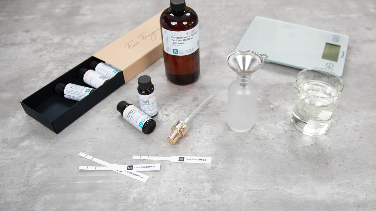 Fine Fragrance Sampler with EcoBase, blotter strips, a scale and other perfume making supplies.
