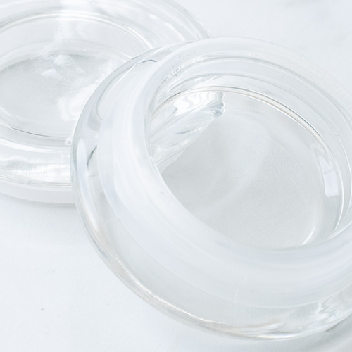 Glass lids for candle jars.